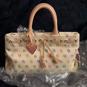 Dooney & Bourke white tassel